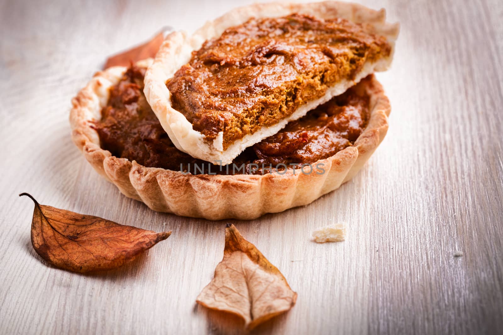 Slices of Pumpkin pie on a stone surface