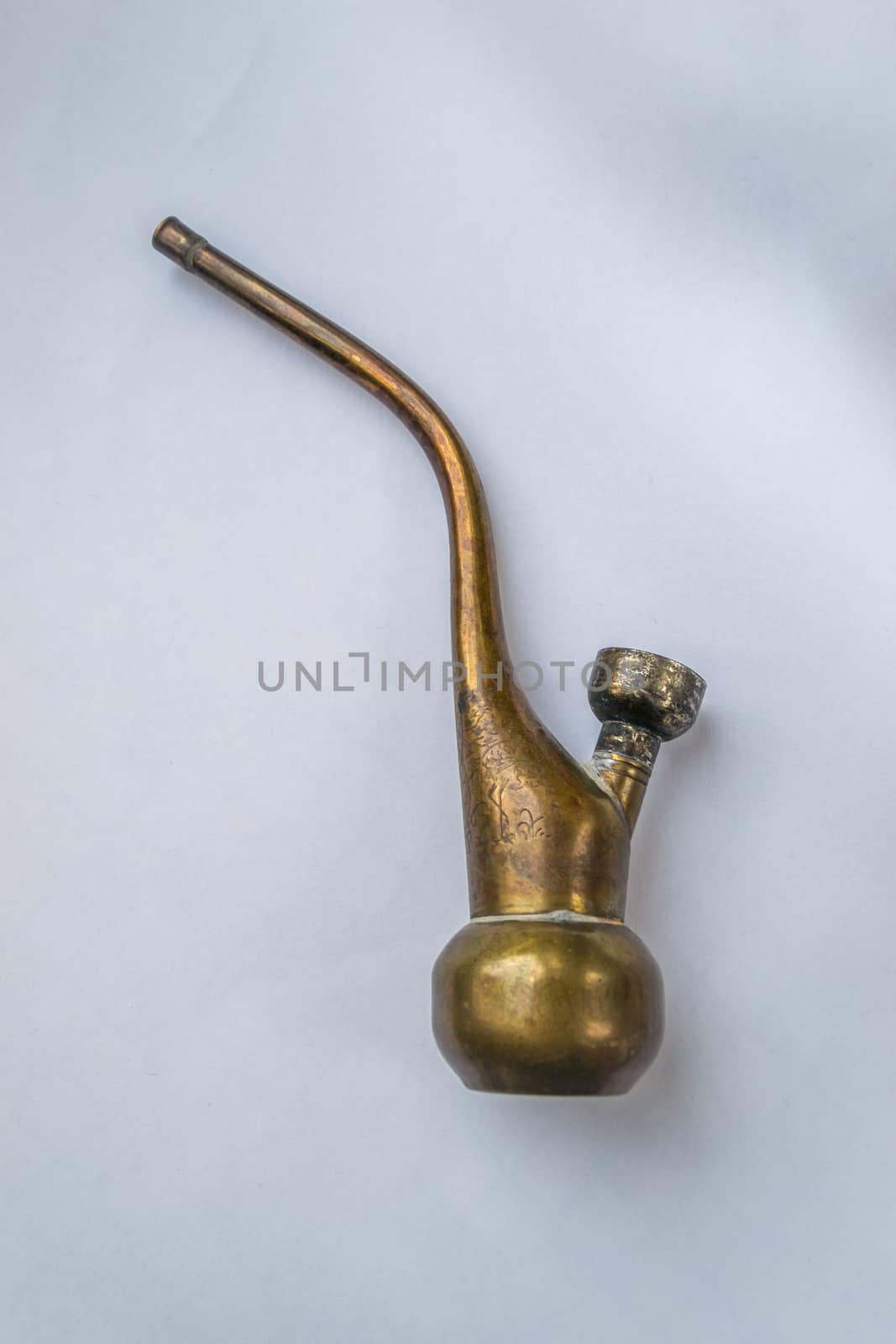 Golden colour brass smoking pipe