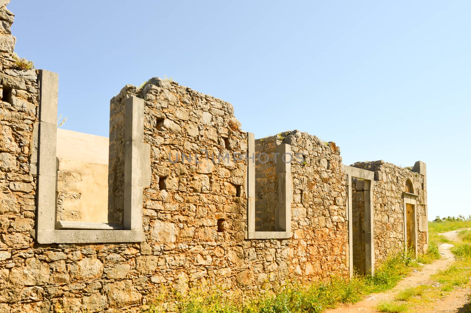 Ruined wall of an ancient abbey in the mountains of southern Crete