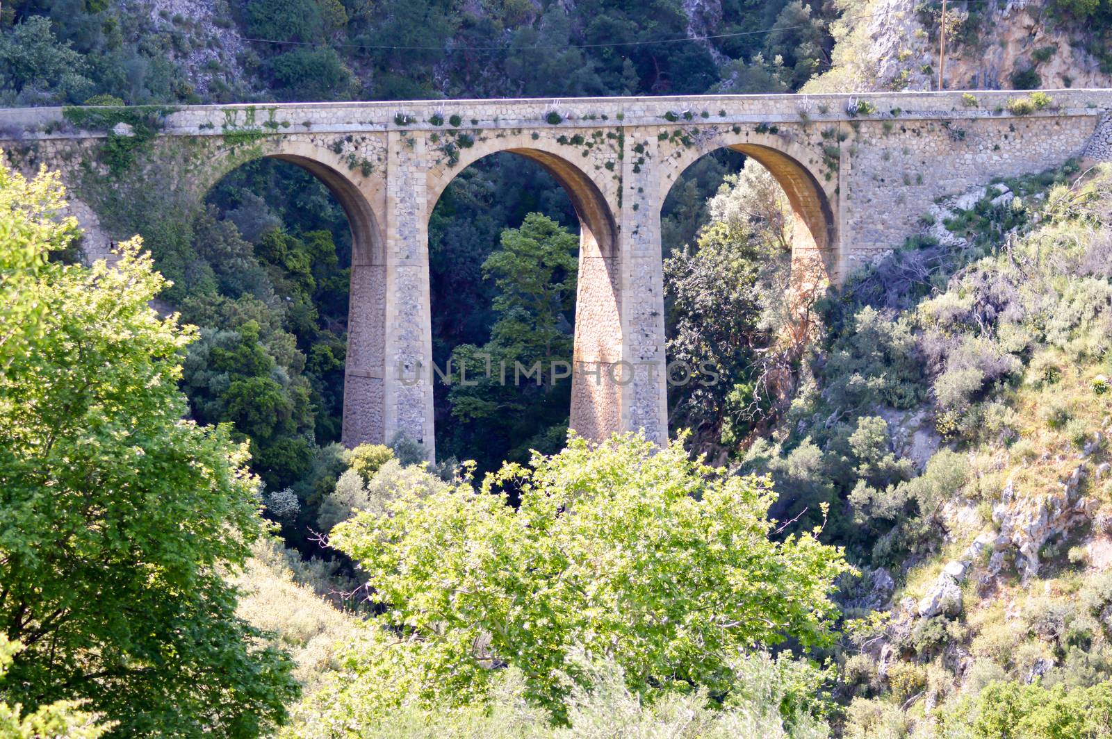 Ancient stone viaduct in the mountains of central Crete