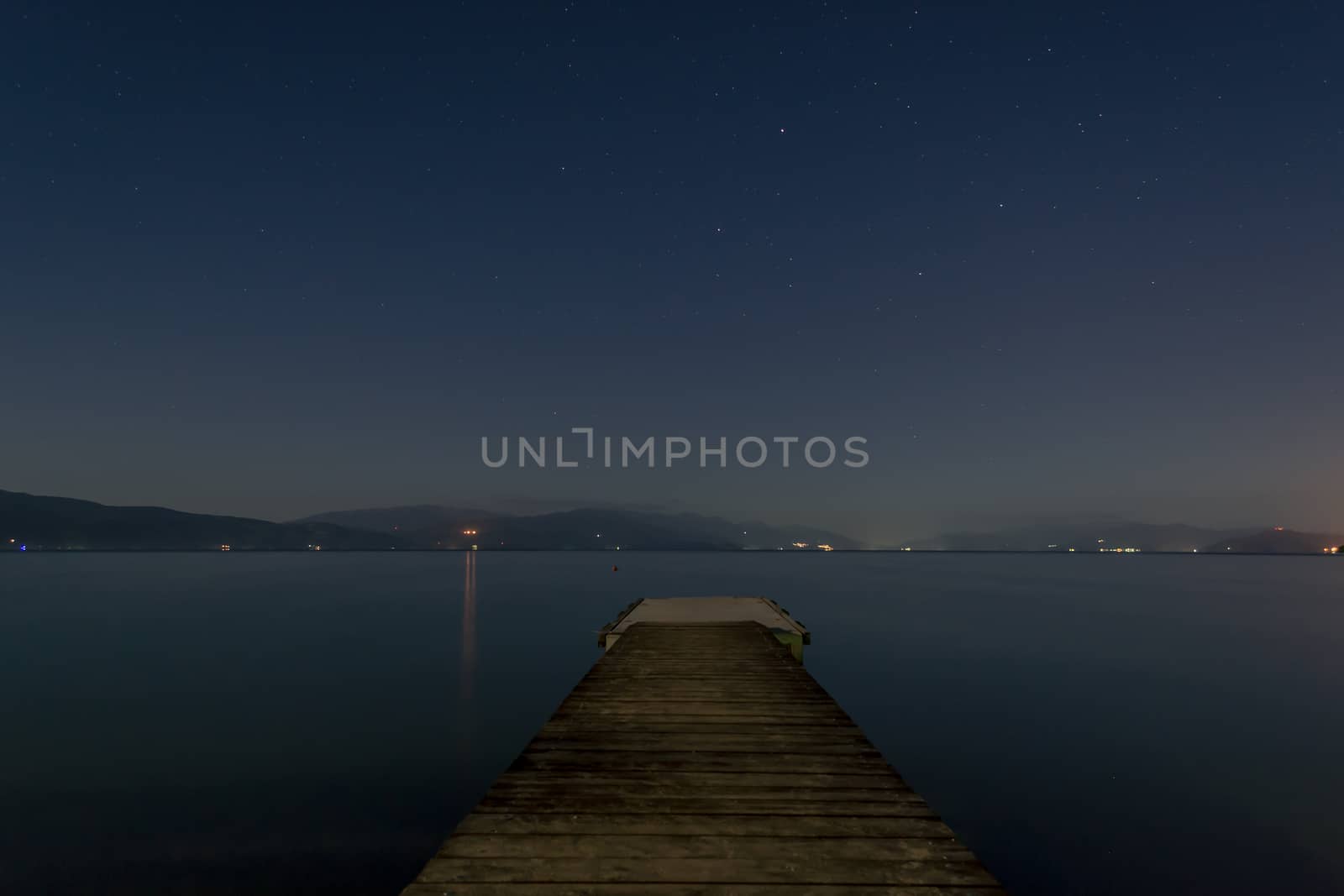 Night on the peaceful lake, a milion stars view, and the dock to stand up and be happy to be there.