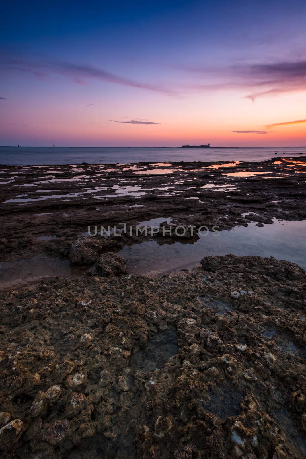 Fantastic sunset on the beach of Santci Petri, Chiclana de la Frontera, Cadiz, Spain