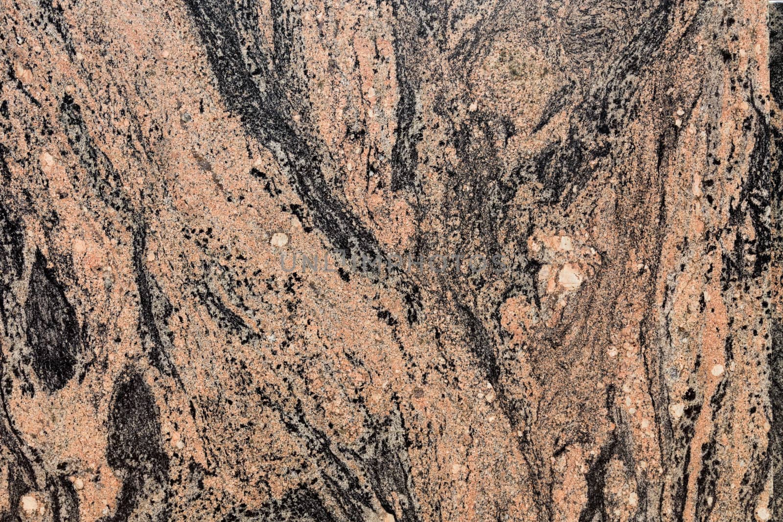 Close up view of a polished granite slab.