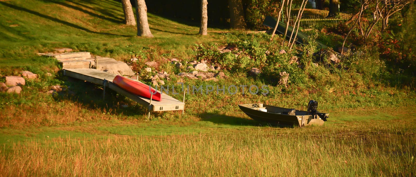 Boat with motor next to dock