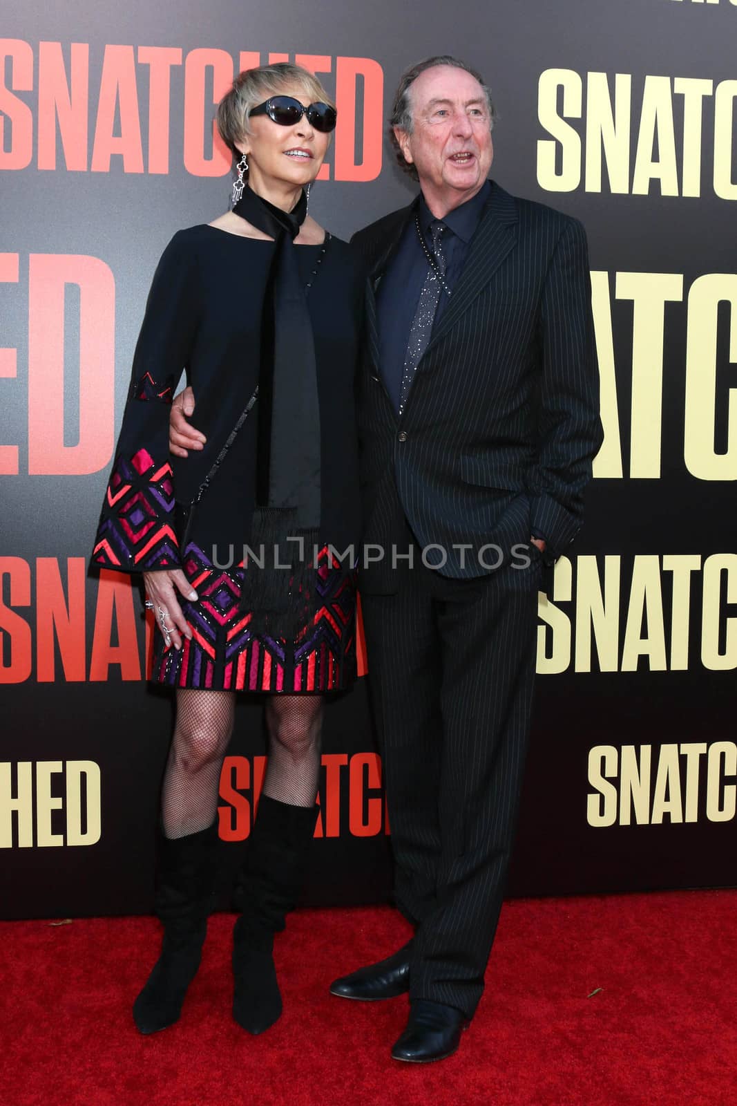 Eric Idle, Lyn Ashley at the "Snatched" World Premiere, Village Theater, Westwood, CA 05-10-17