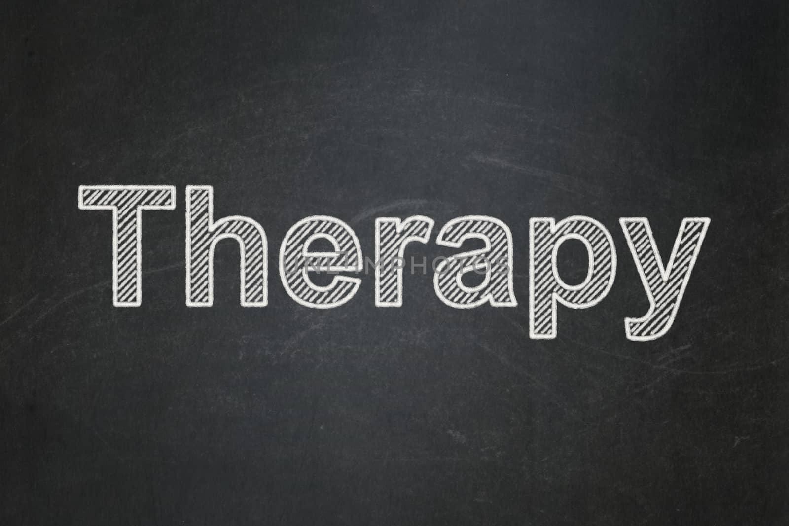Healthcare concept: text Therapy on Black chalkboard background