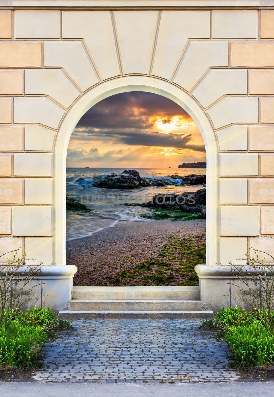 Frame of desolate immured door with picture of sea shore morning  and steps of cut stone