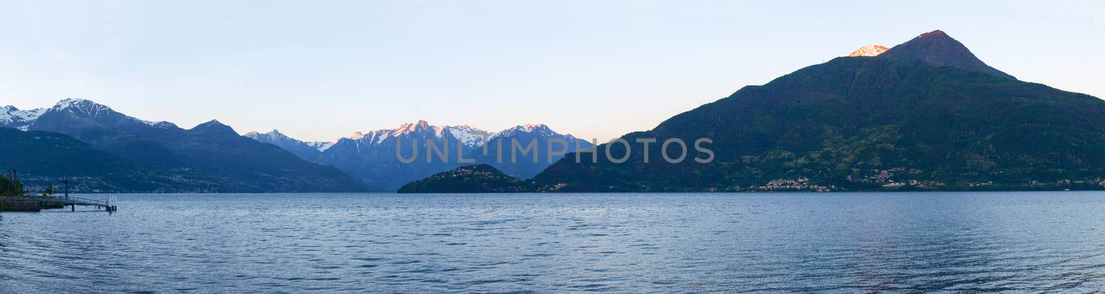 Pianello del Lario, Lake of Como, Italy: Panorama of the Lake of Como from the Beach at evening sunlight