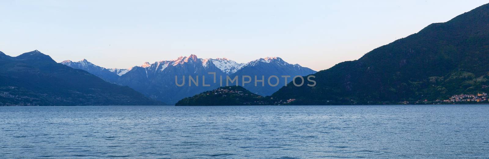 Panorama of the Lake of Como from the Beach at evening sunlight by mauro_piccardi