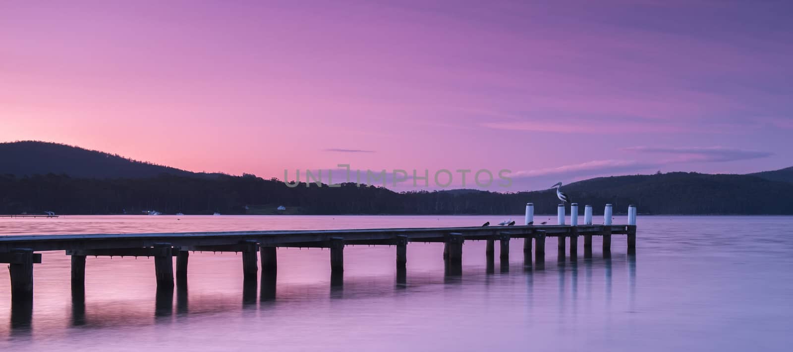 Port Arthur pier at dusk in Tasmania, Australia.