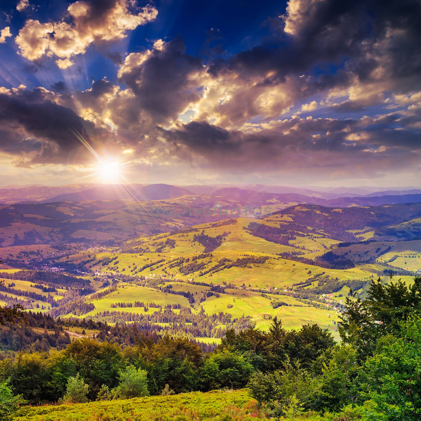 village on hillside meadow with forest in mountain at sunset by Pellinni