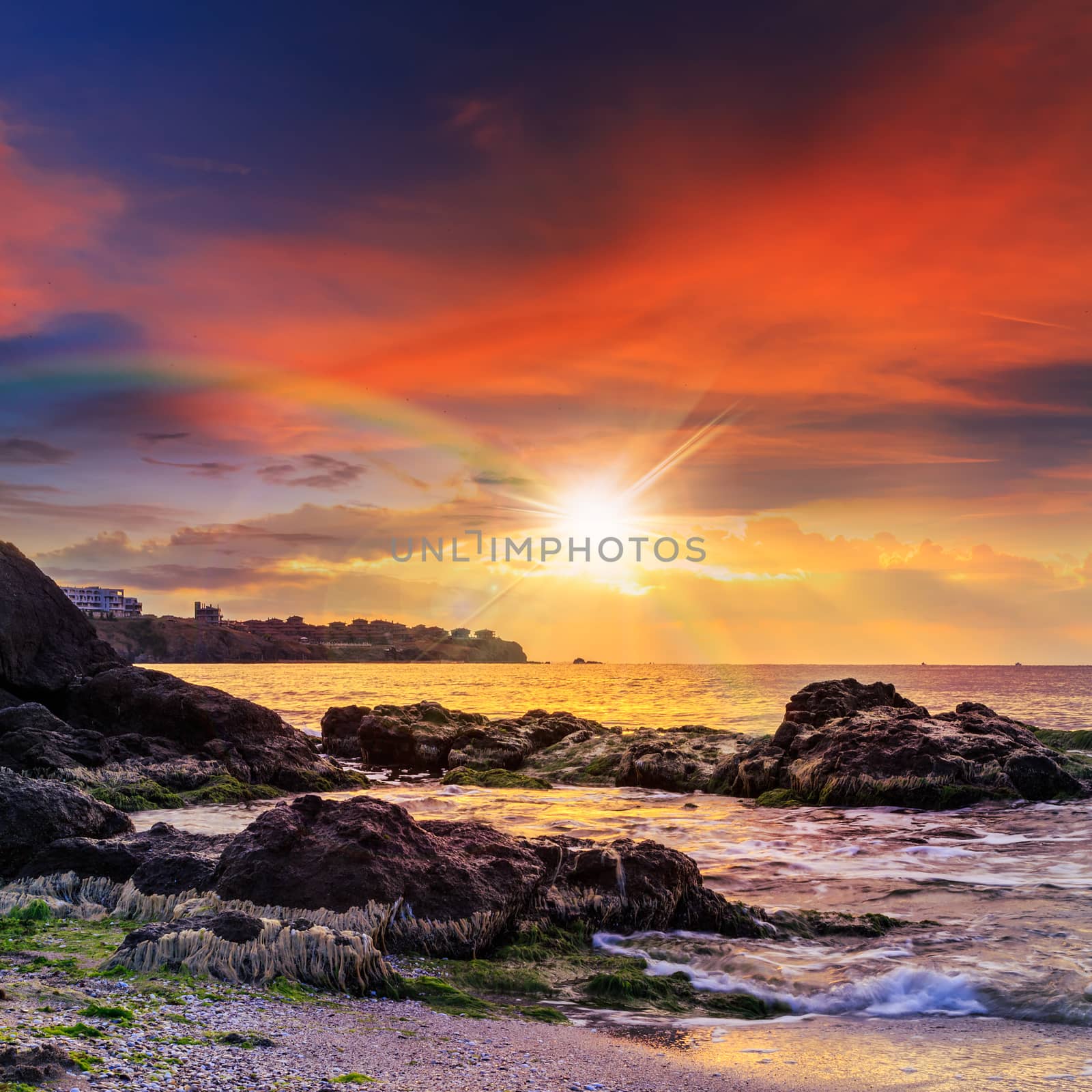 sea wave breaks about boulders by Pellinni