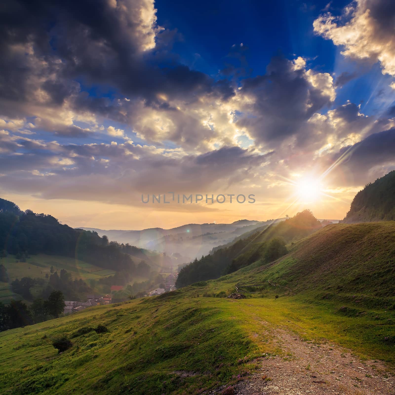 cold fog on hot sunset in mountains by Pellinni