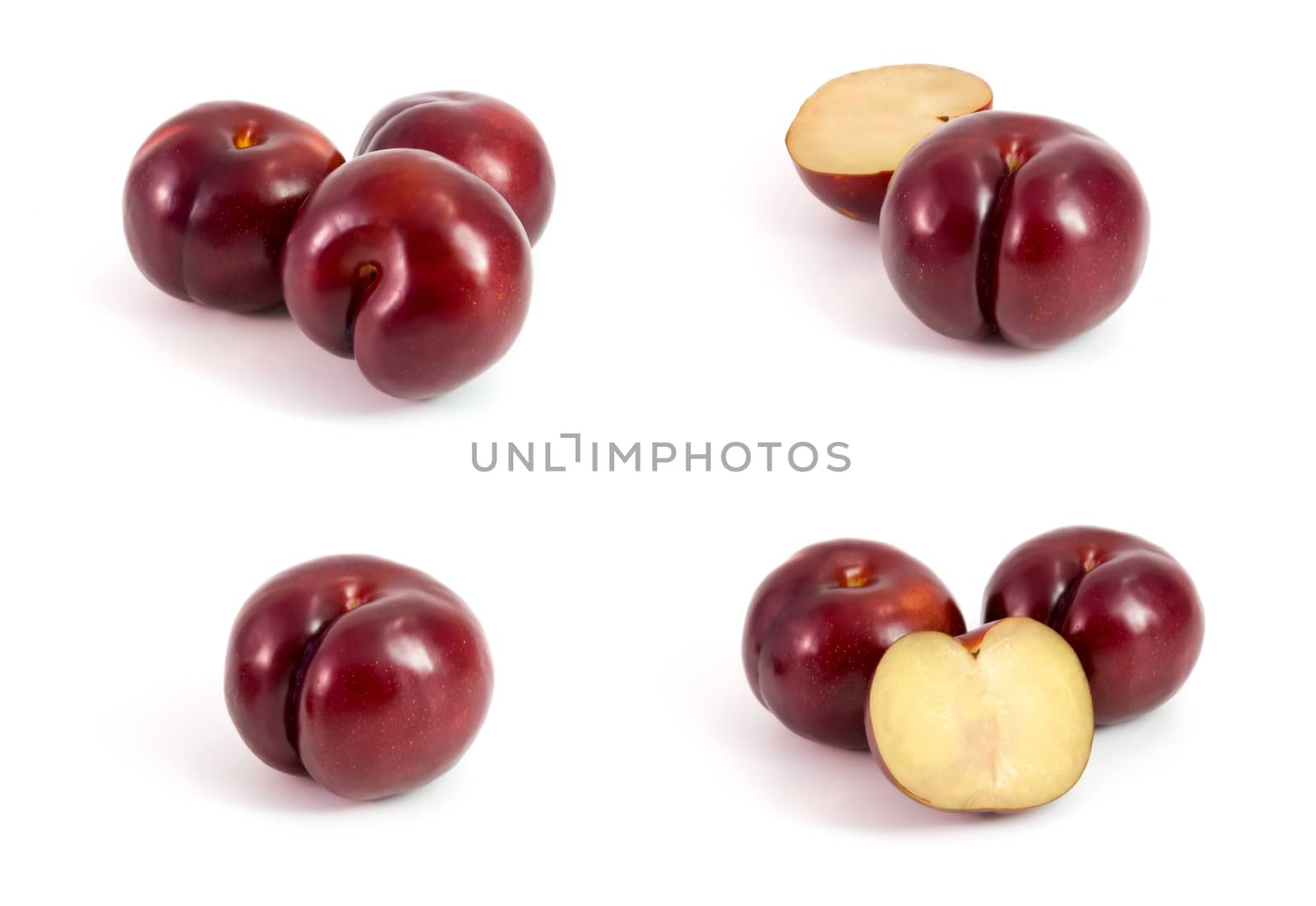 Prunes Plum fruit isolated on white  by chingraph