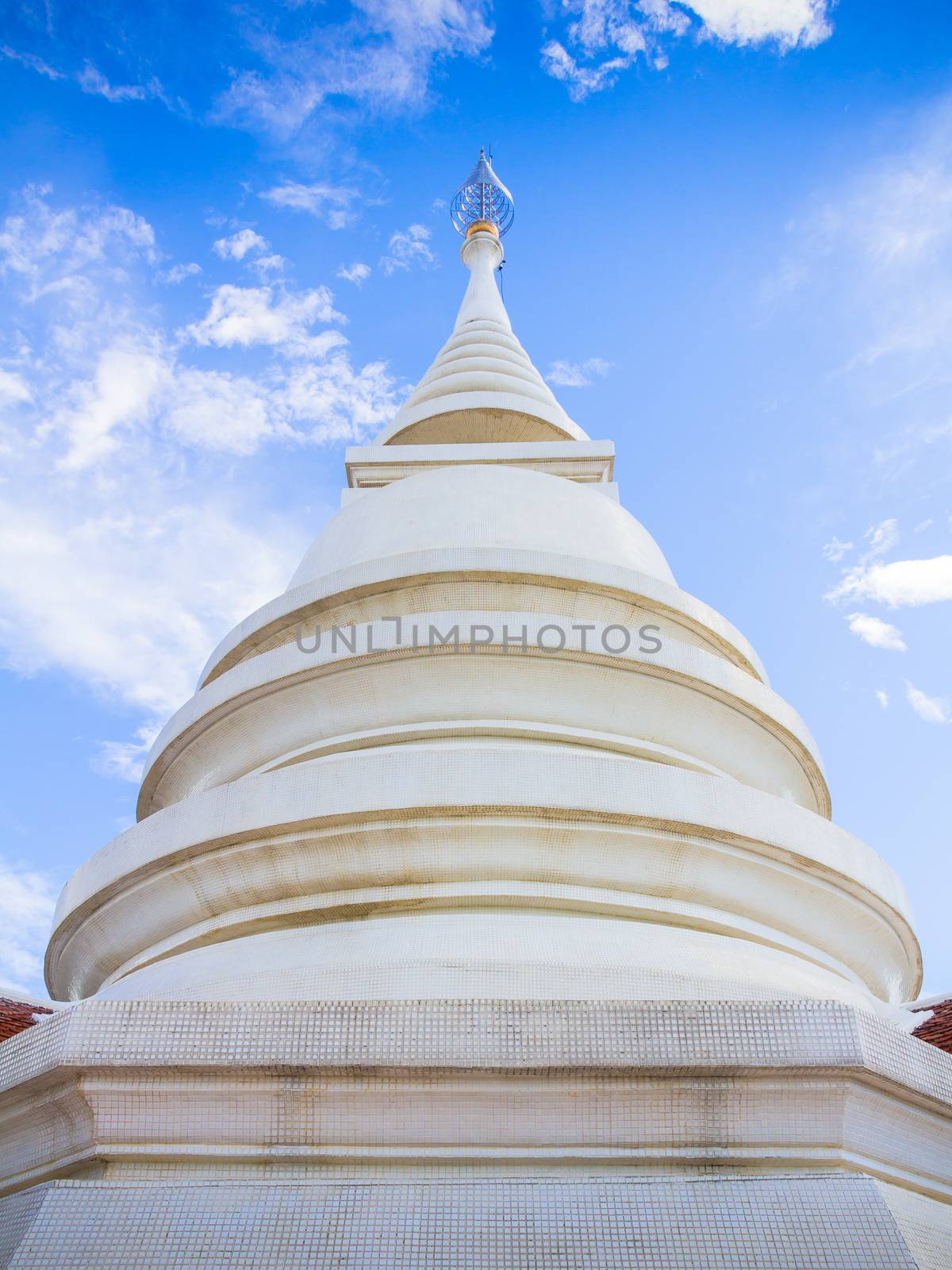 Thai style pagoda of Wat Pra Dhat Pha Ngao Temple Chiang Rai Thailand made of White Mosaic