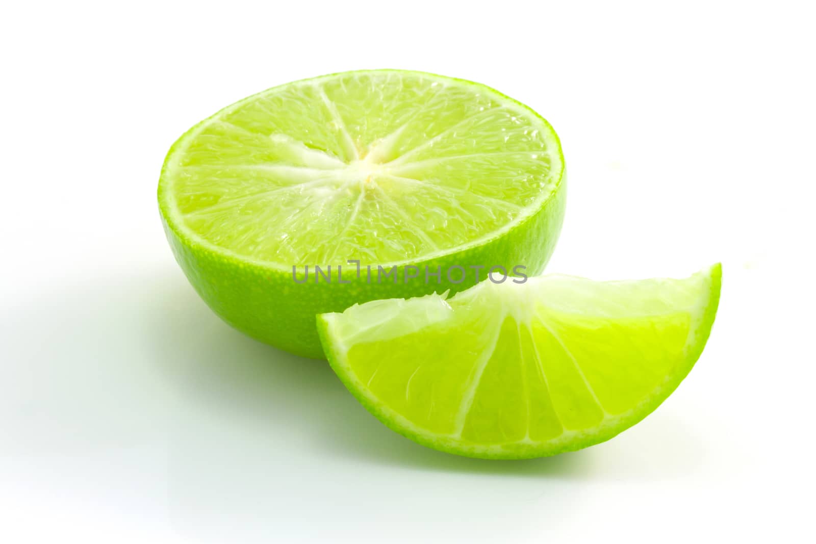 green lime lemon isolated on white by chingraph