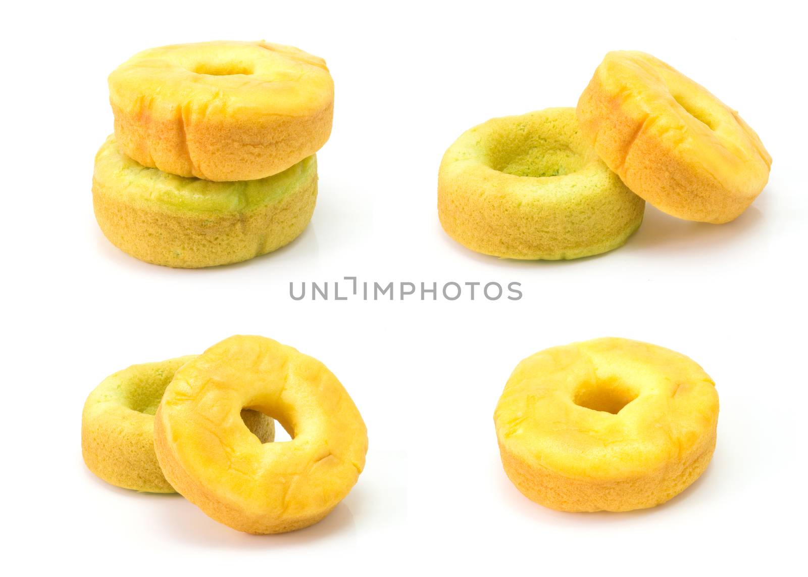 set of yellow and green donut cake isolated on white by chingraph