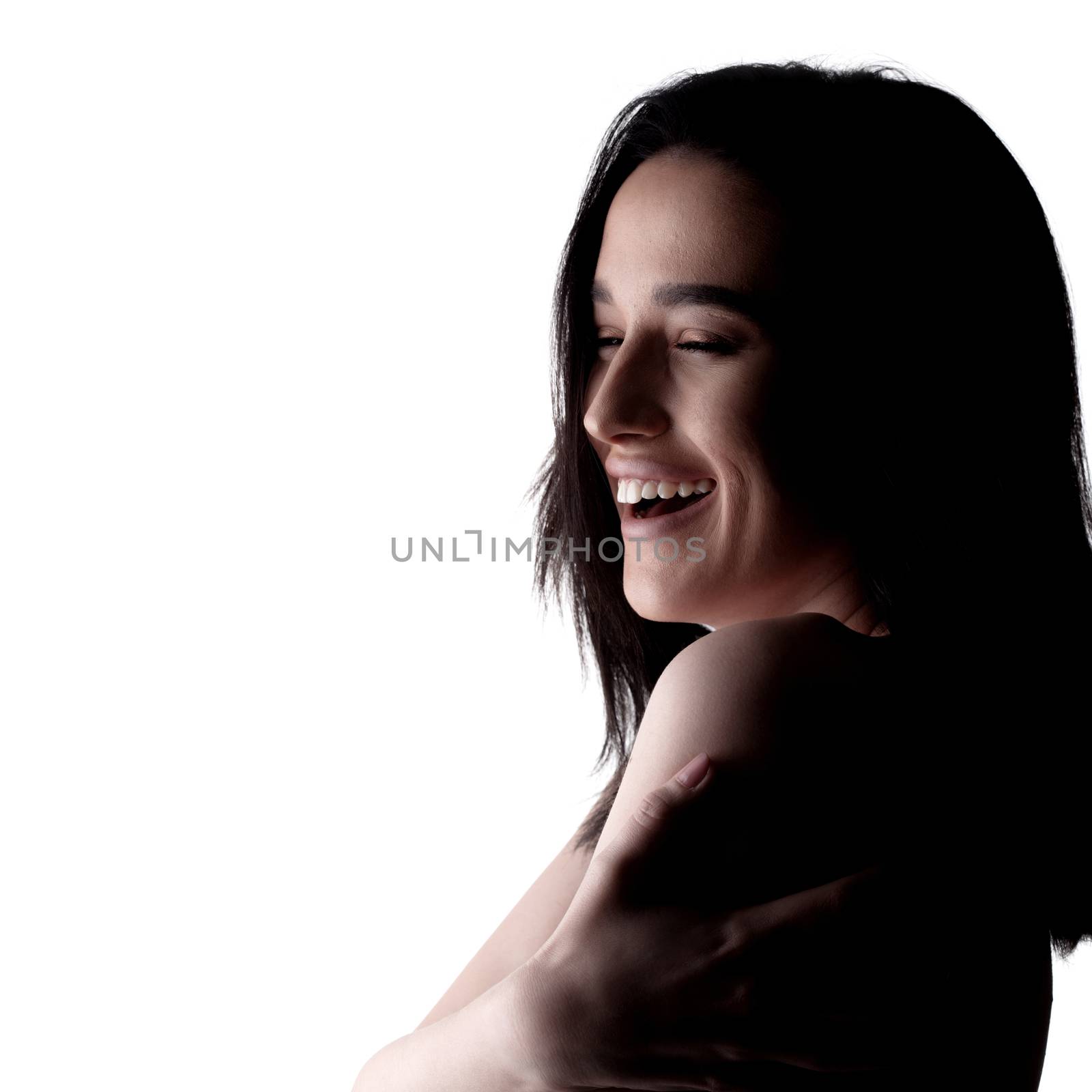 sensual portrait of a beautiful black haired lady smiling