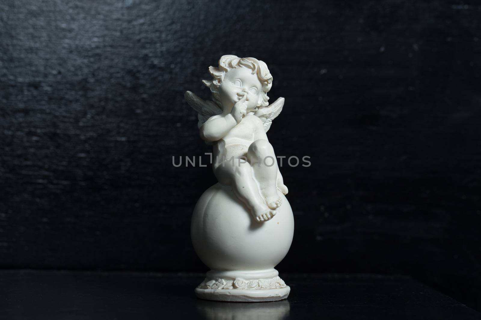 Beautiful angel figurine on the background by boys1983@mail.ru