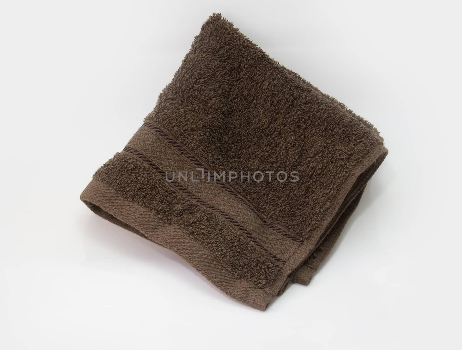 brown towel, bath towel isolated on white