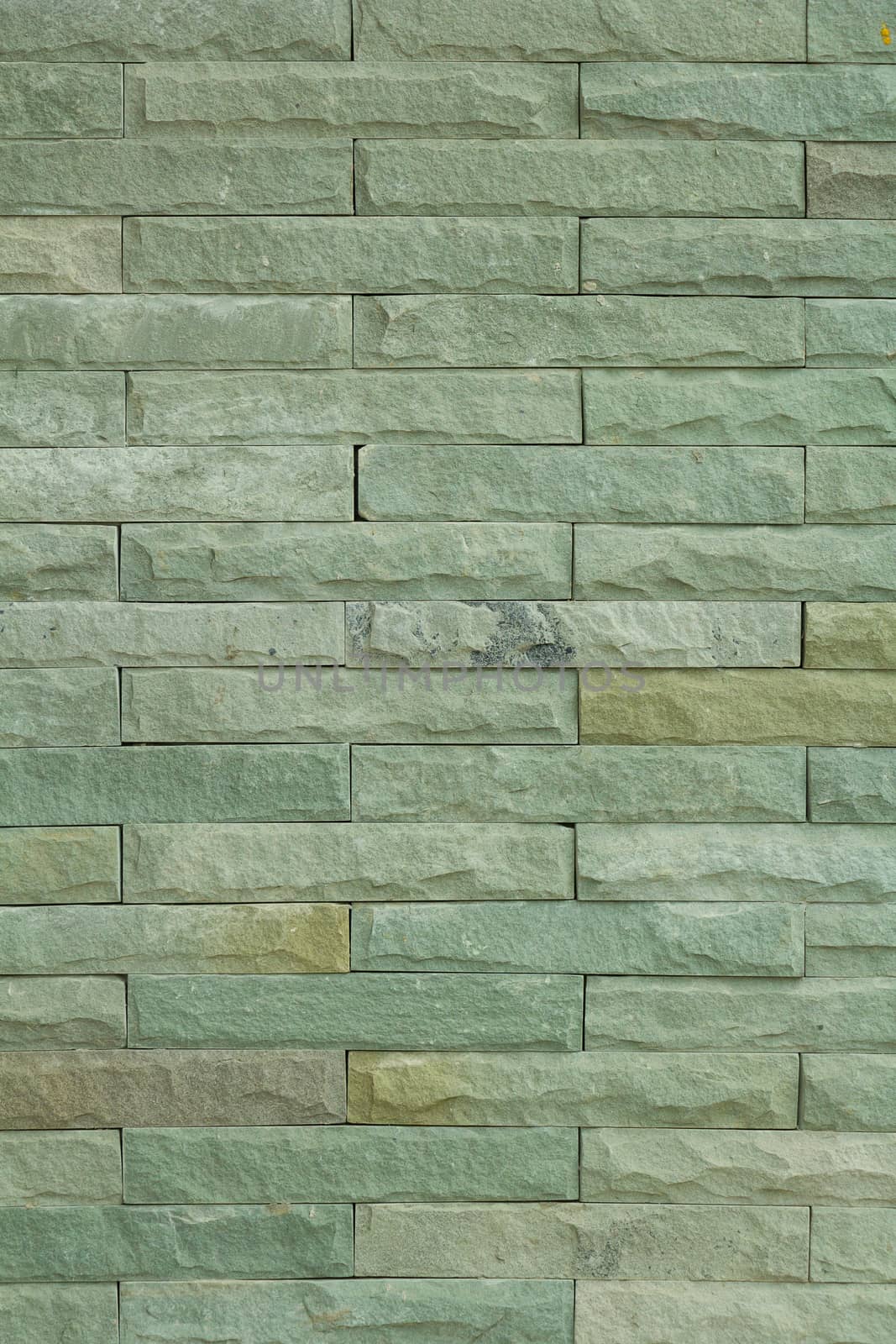 green decorative stone wall texture background