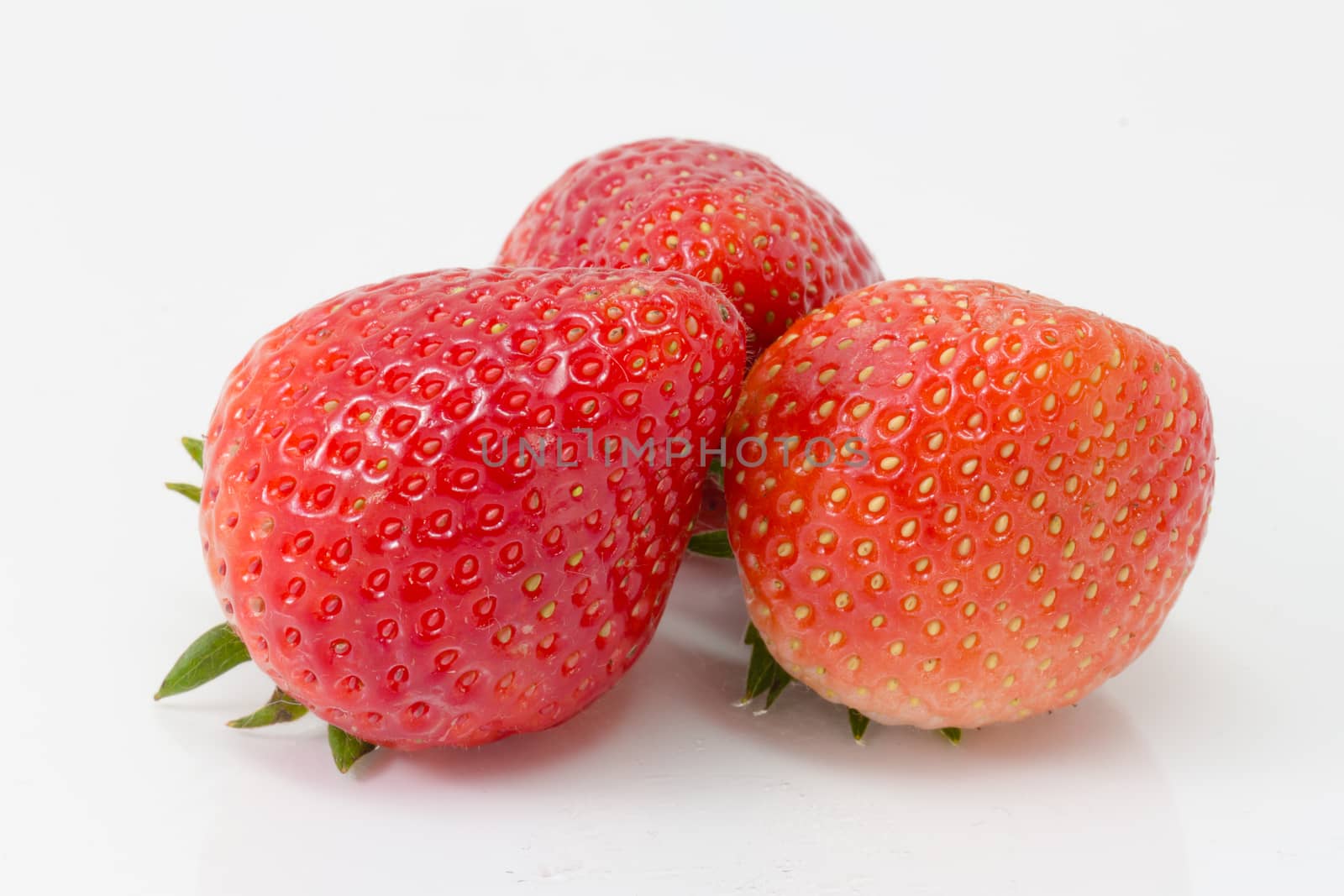 fresh strawberry isolated on white background by chingraph