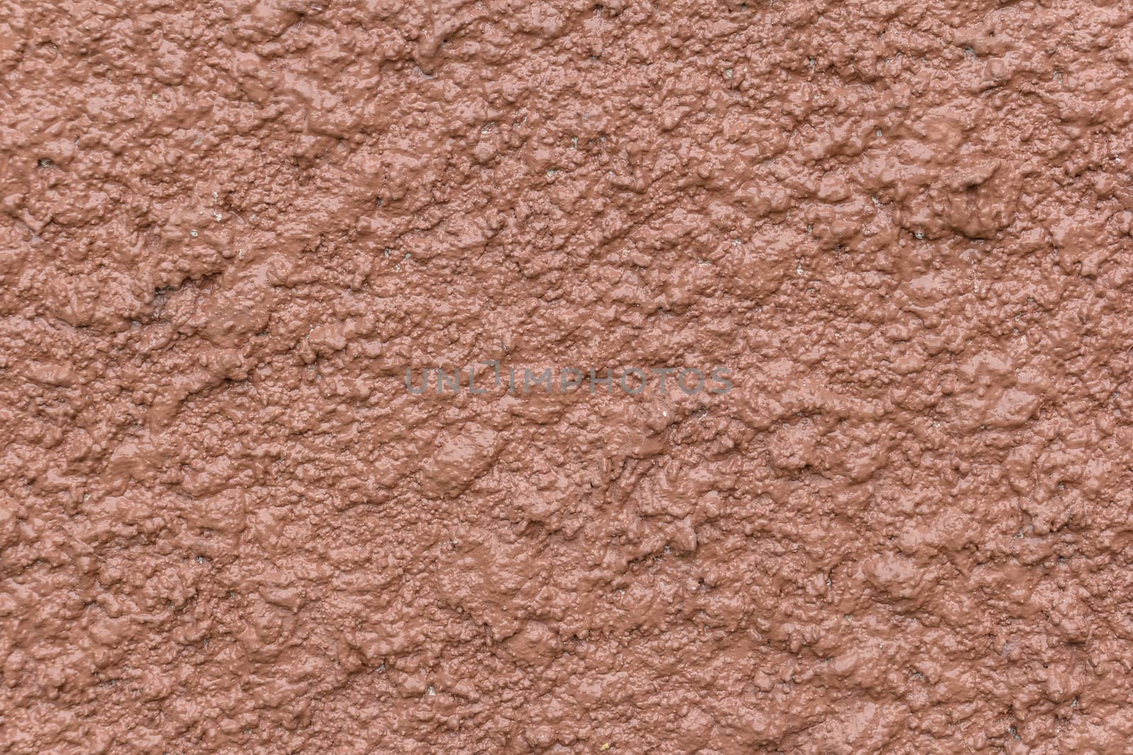 Brown bump plaster wall coating with oil paint texture