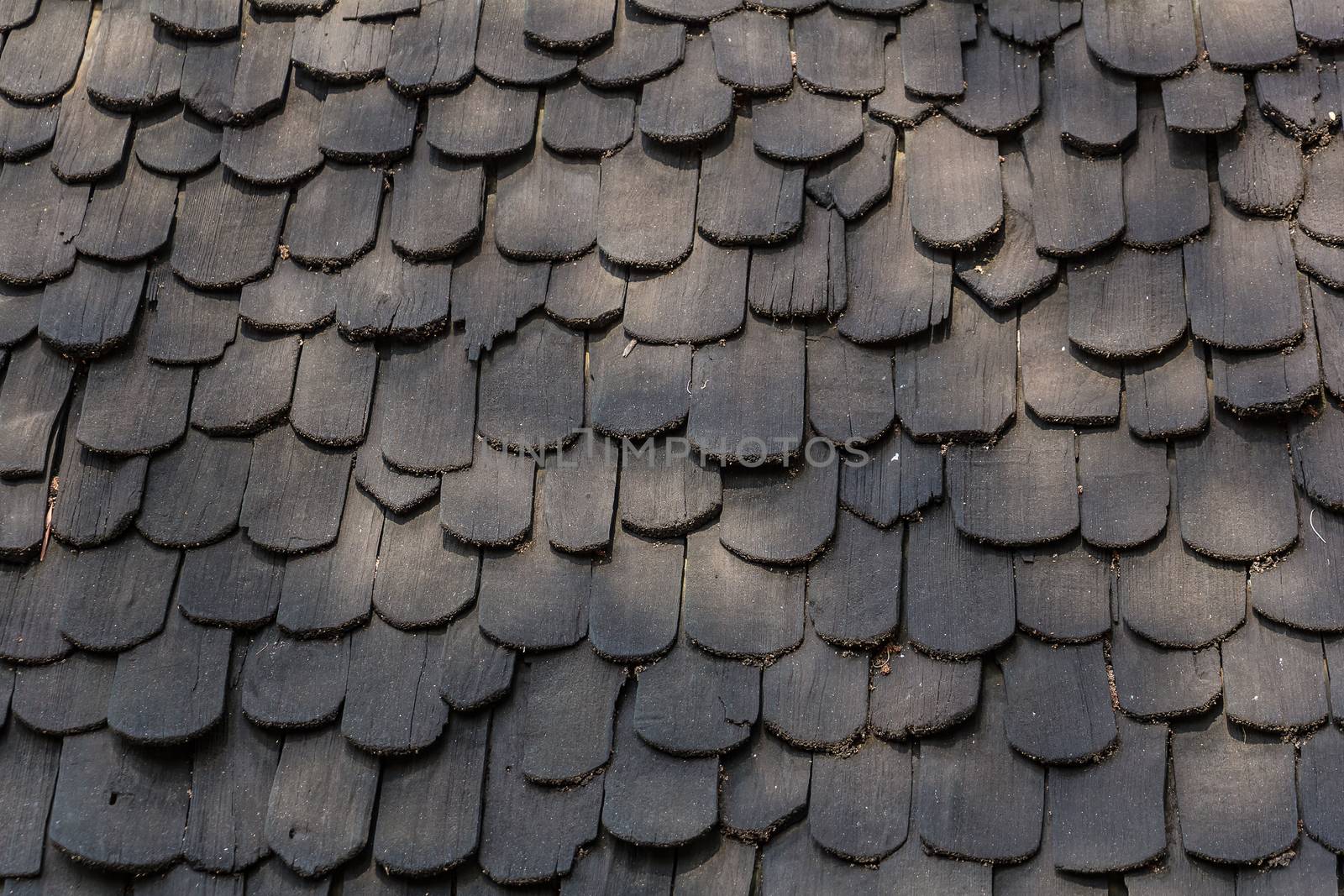 old hand made roof made from black wood, wooden roof.cedar roof by chingraph