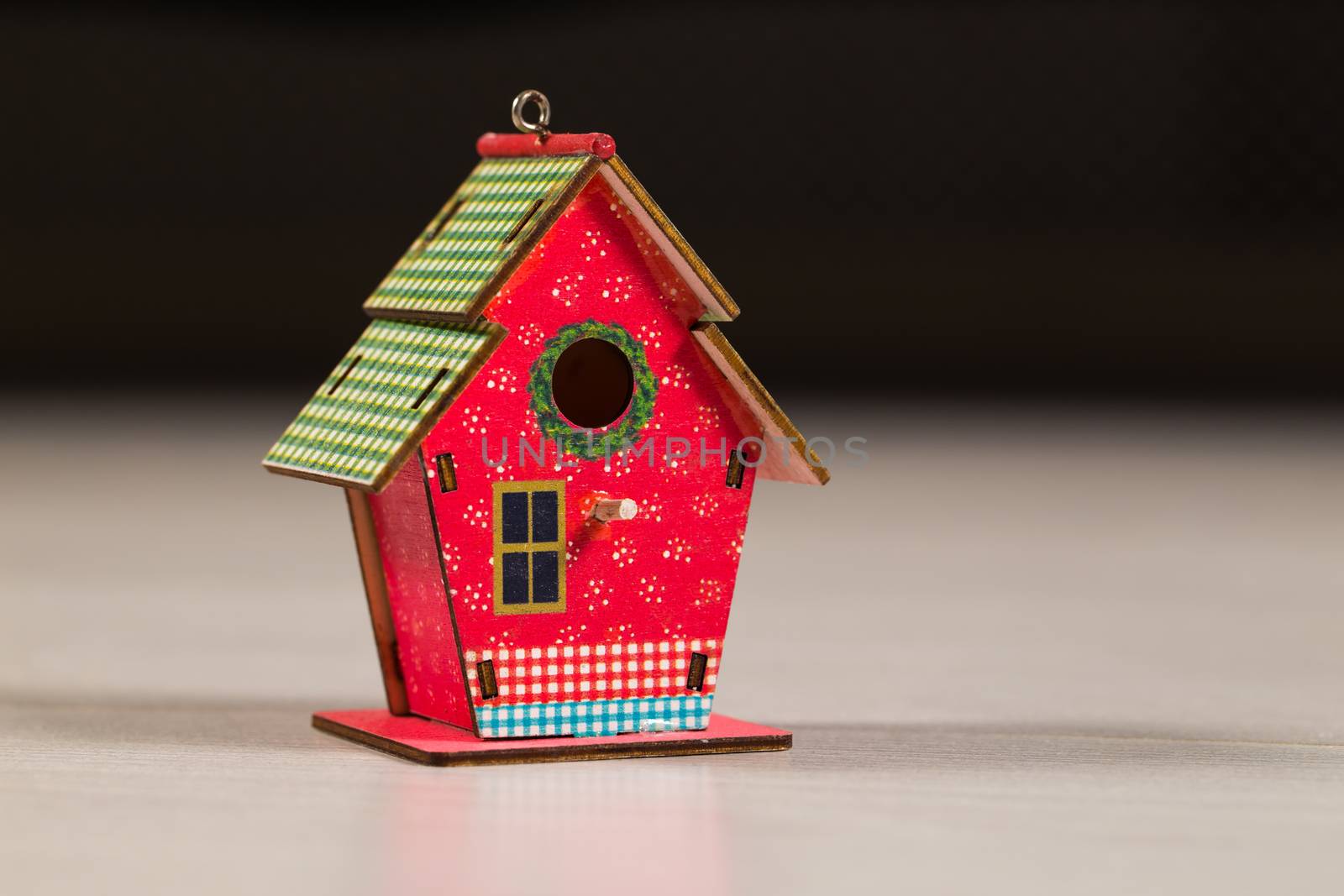 red Birdhouse on the background