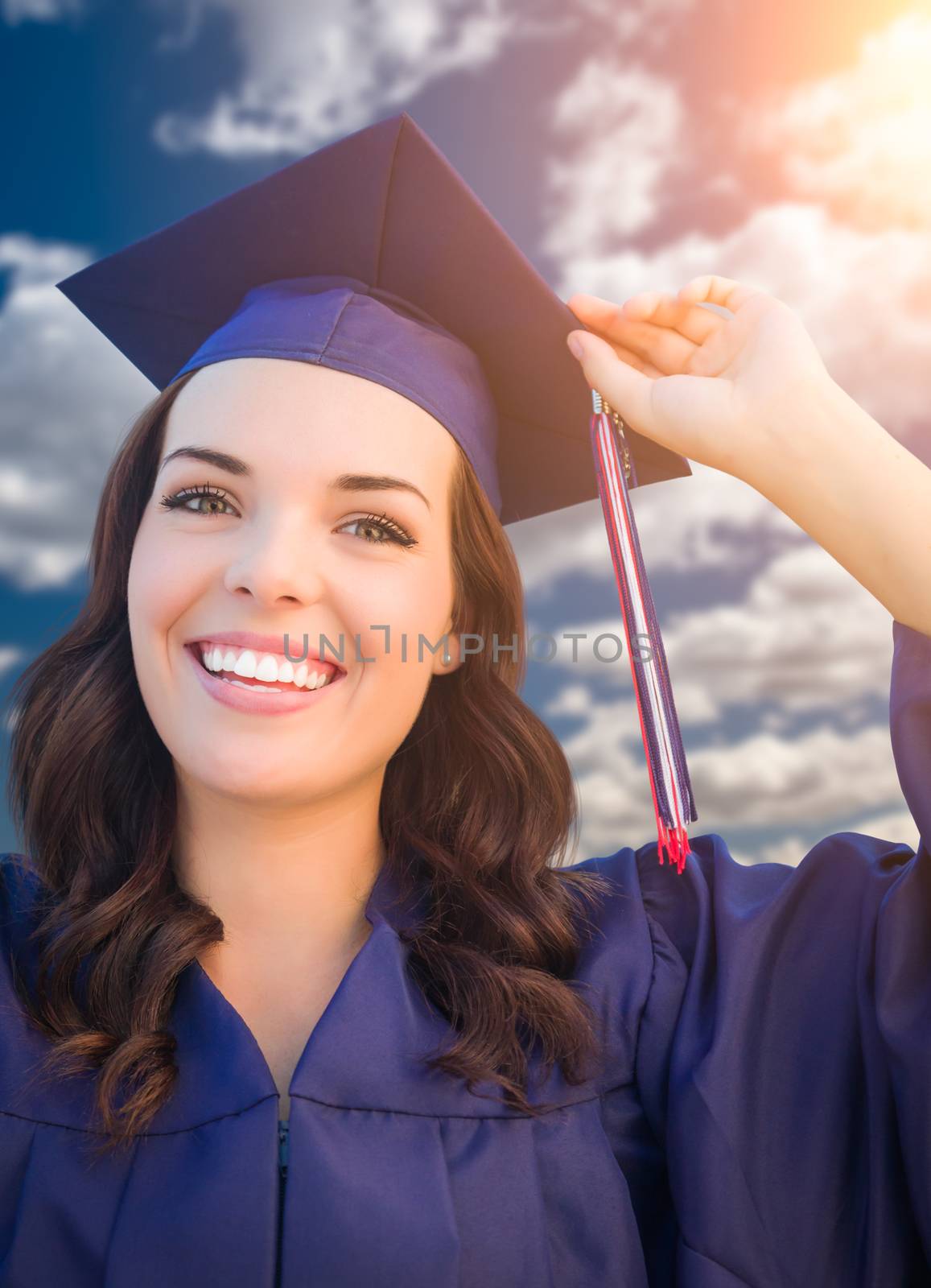 Happy Graduating Mixed Race Woman In Cap and Gown by Feverpitched