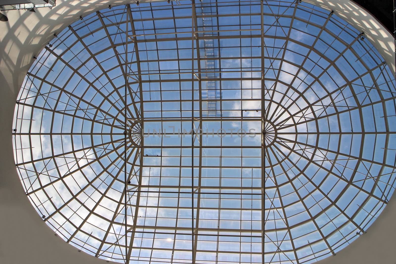 clouds behind a glass roof