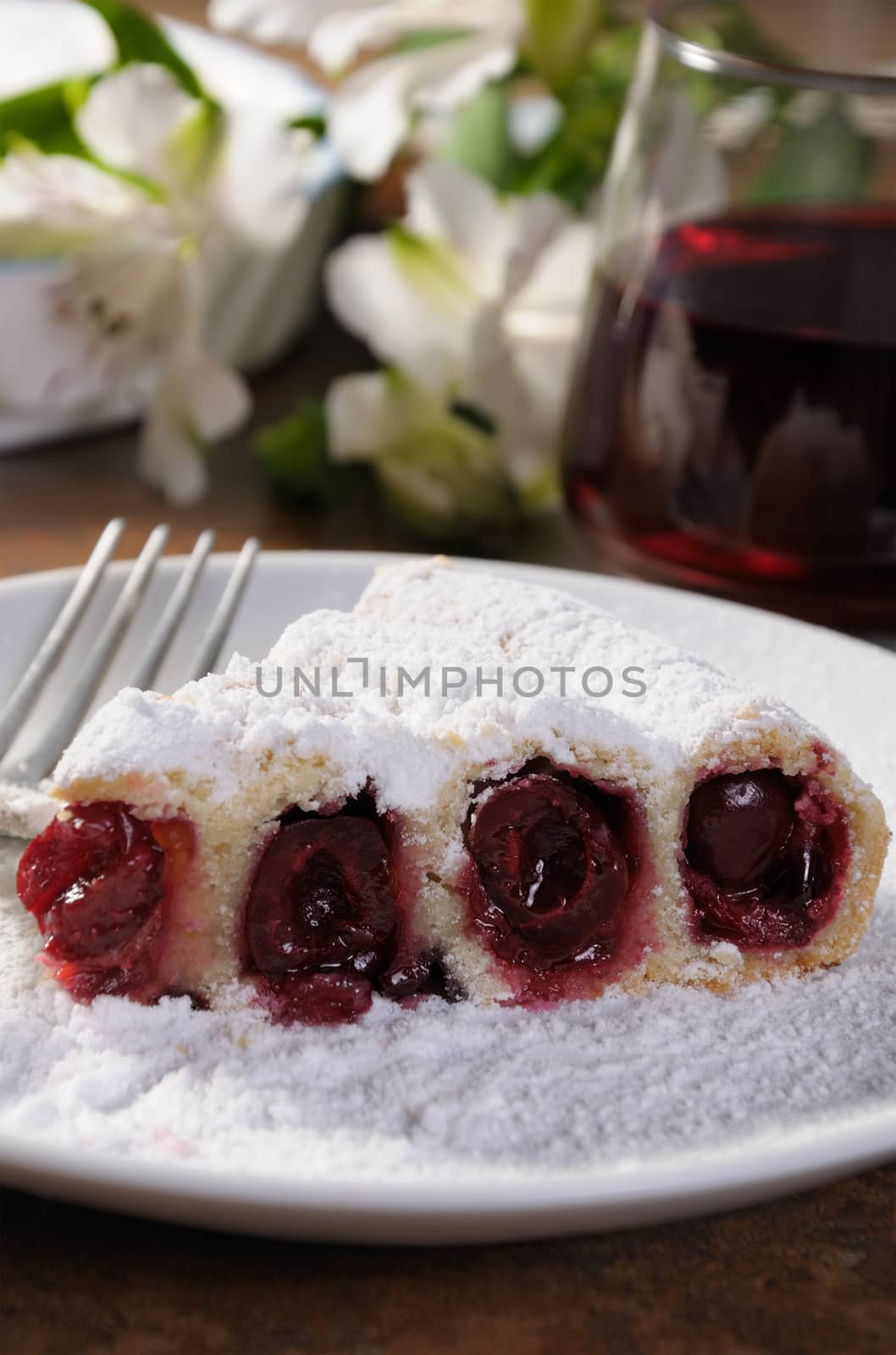 piece of shortcrust  dough wrapped in the form of snails stuffed with cherries