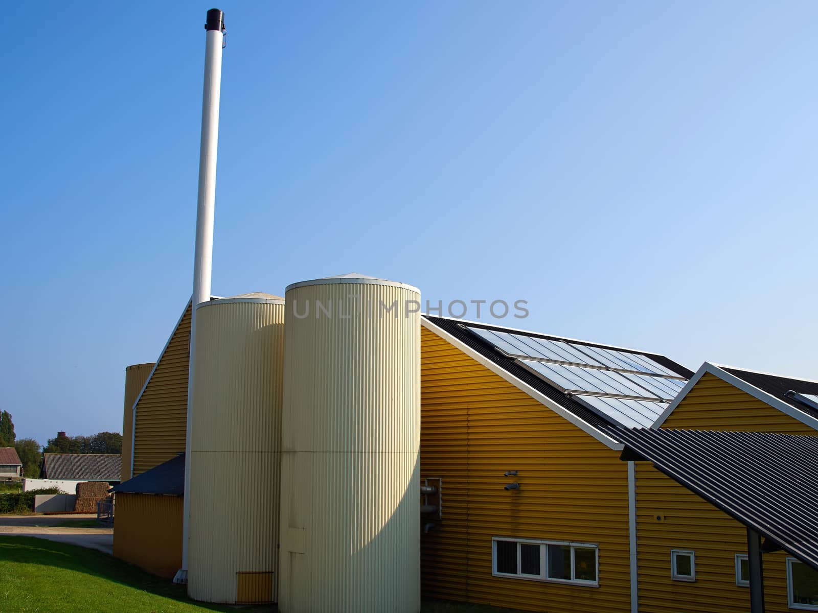 Factory plant building with a chimney modern industry background         