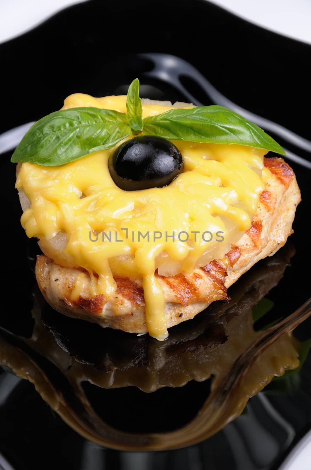 pieces of chicken   brisket a slice of pineapple with cheese