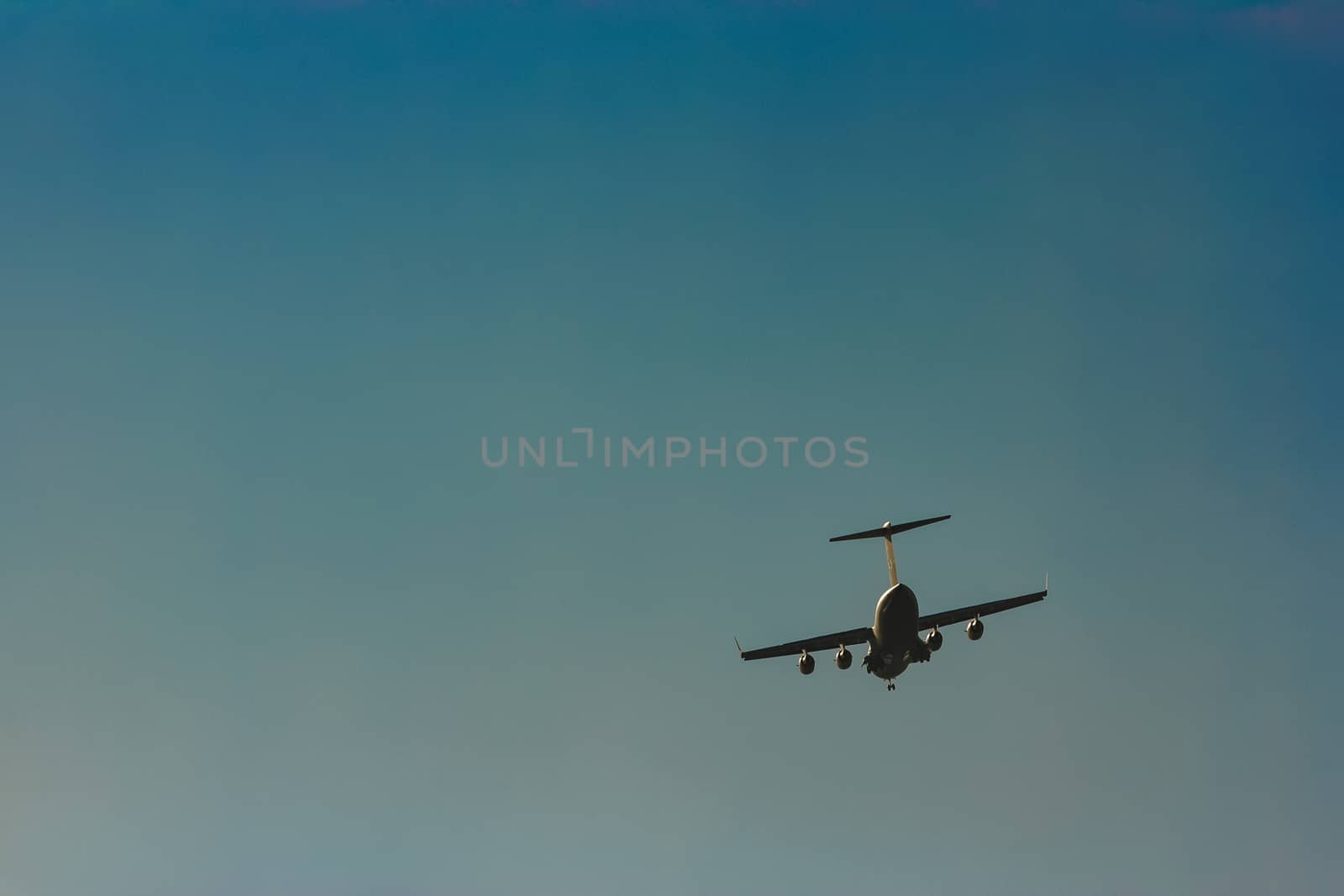 Passenger aircraft flying in the blue sky