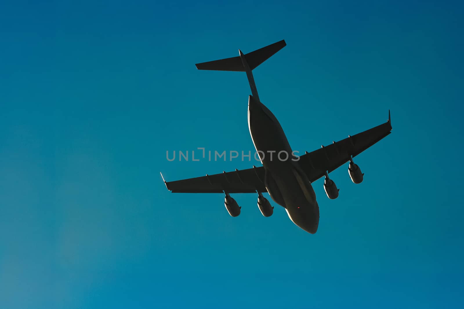 Passenger aircraft flying in the blue sky