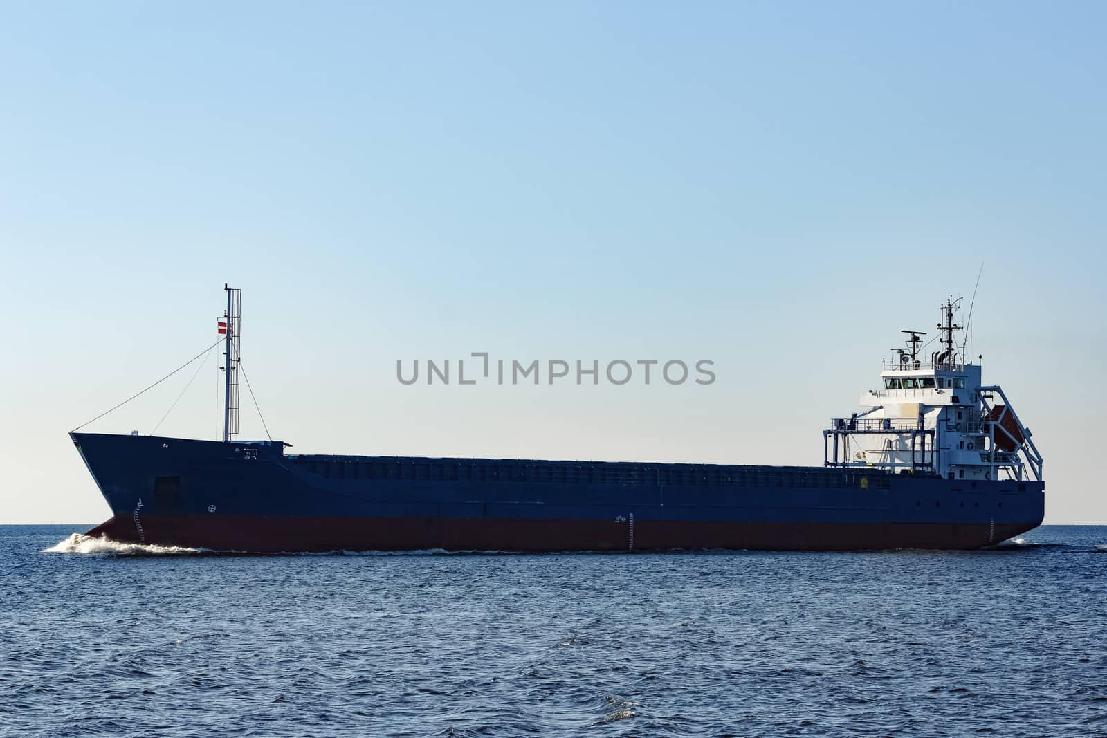 Blue cargo ship sailing from the Baltic sea