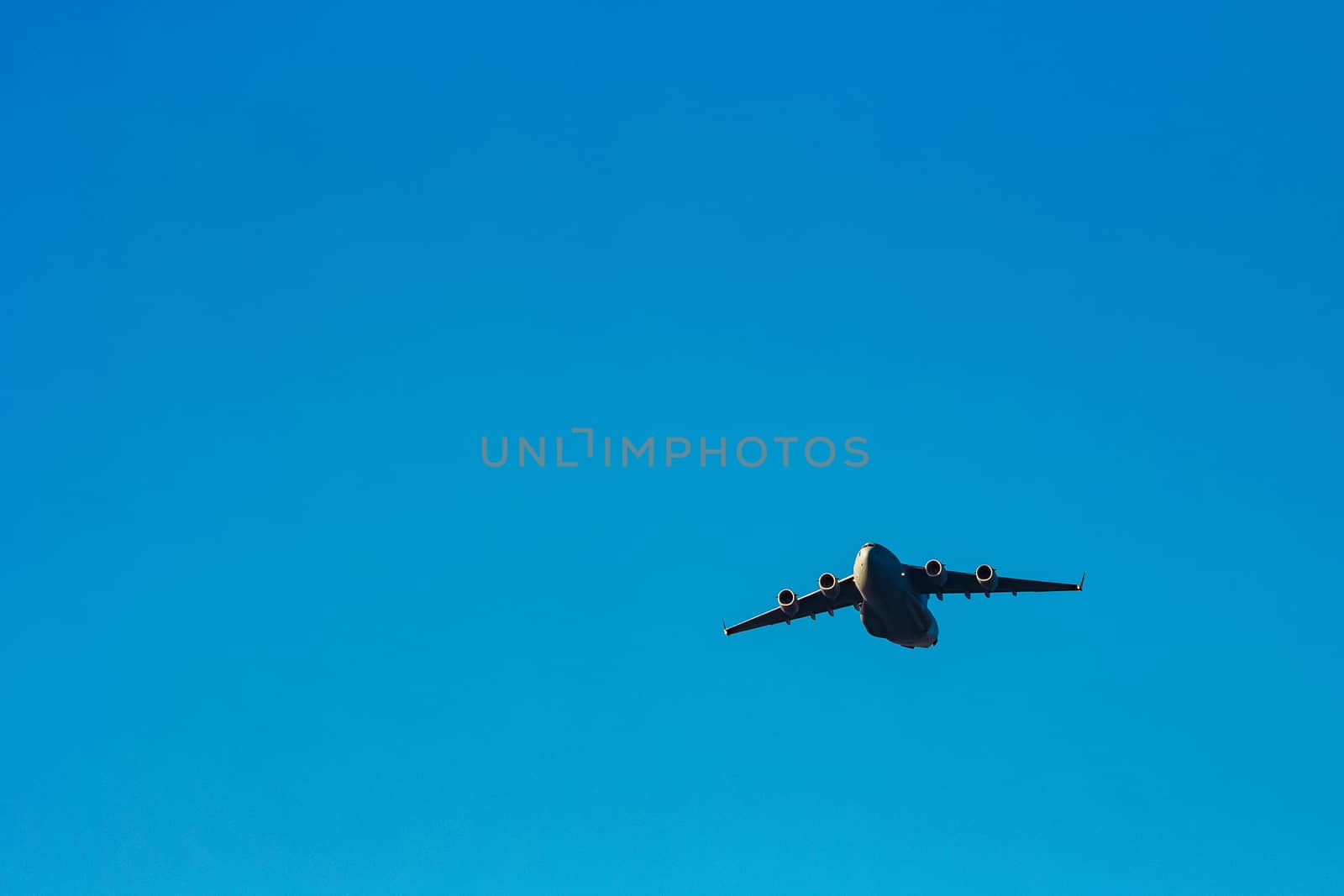 Passenger aircraft flying in the blue sky