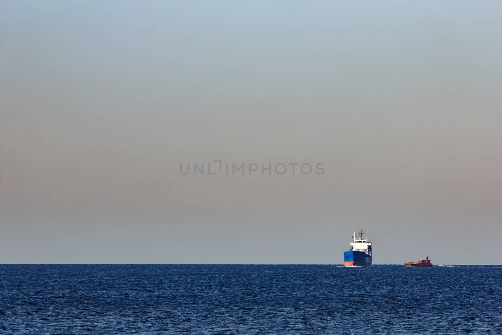 Blue cargo ship sailing from the Baltic sea