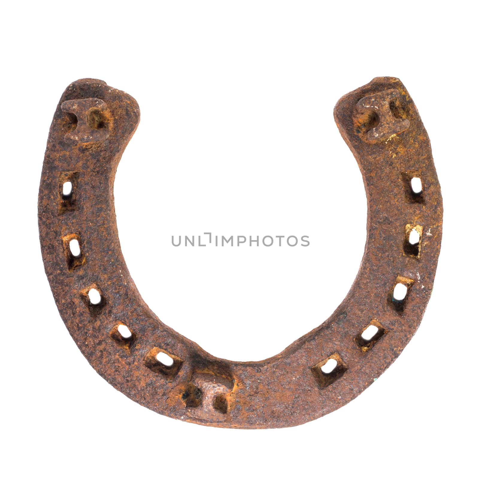 rusty horseshoe isolated on a white background by uvisni