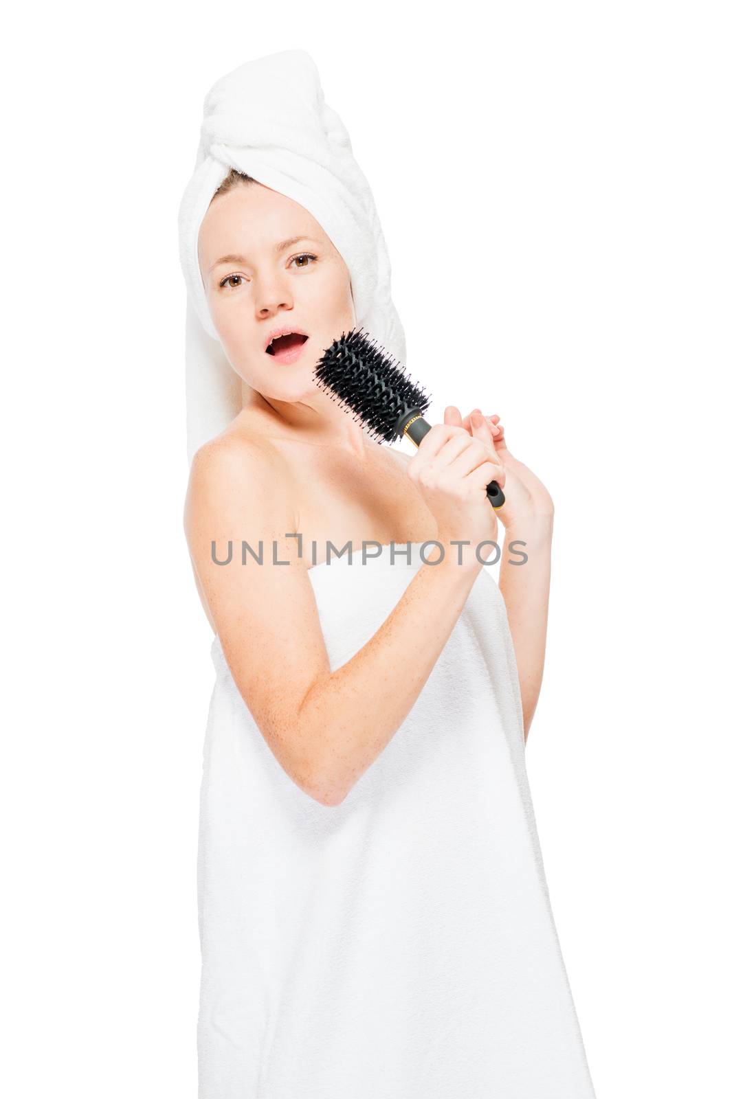 Vertical portrait of a beautiful girl, her hobby singing in a bath