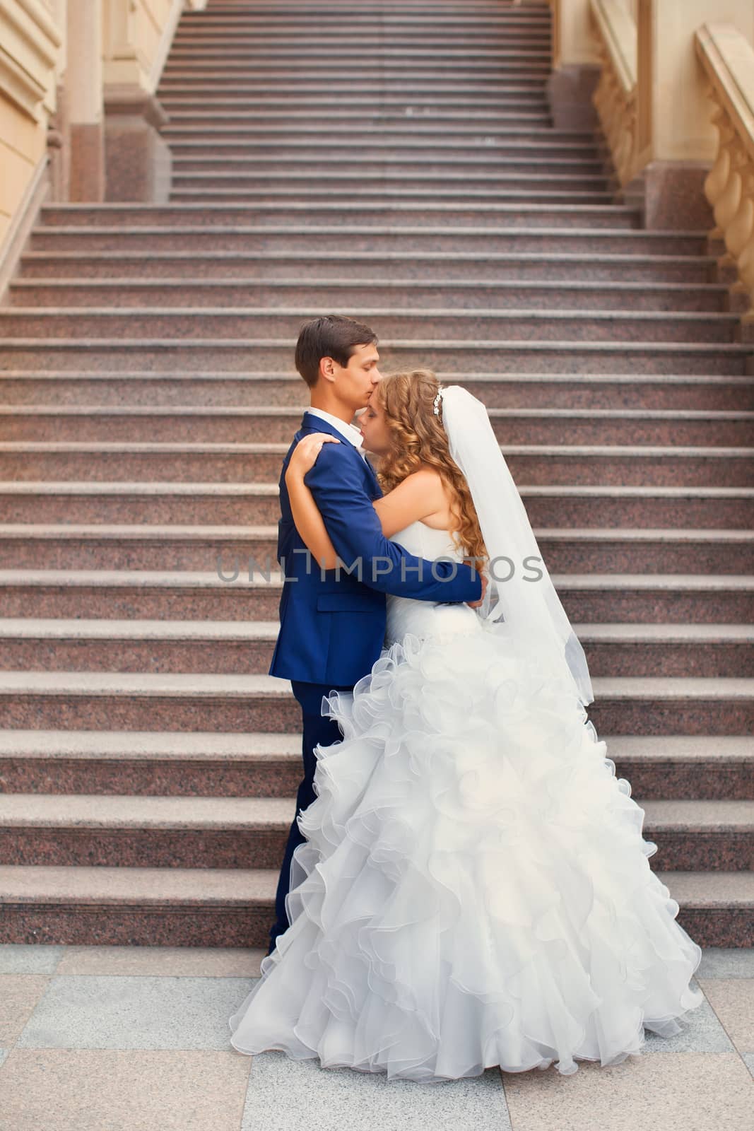 Newlyweds on a walk in the countryside by lanser314