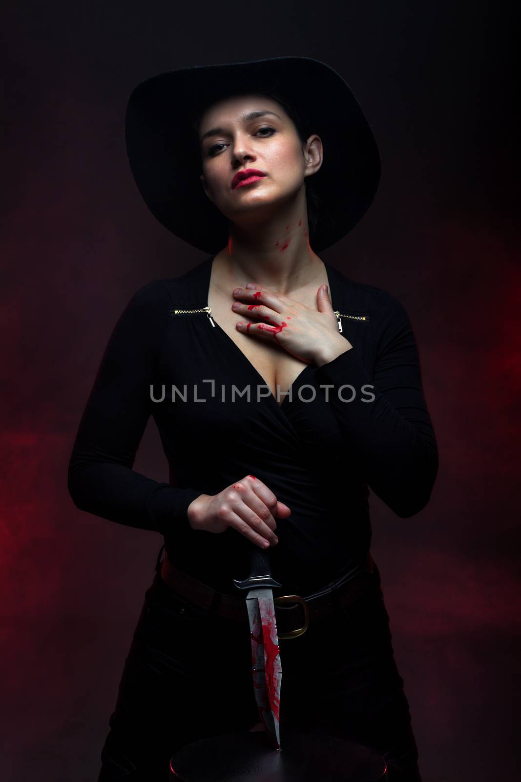 girl with a huge bloody knife, red smoke background