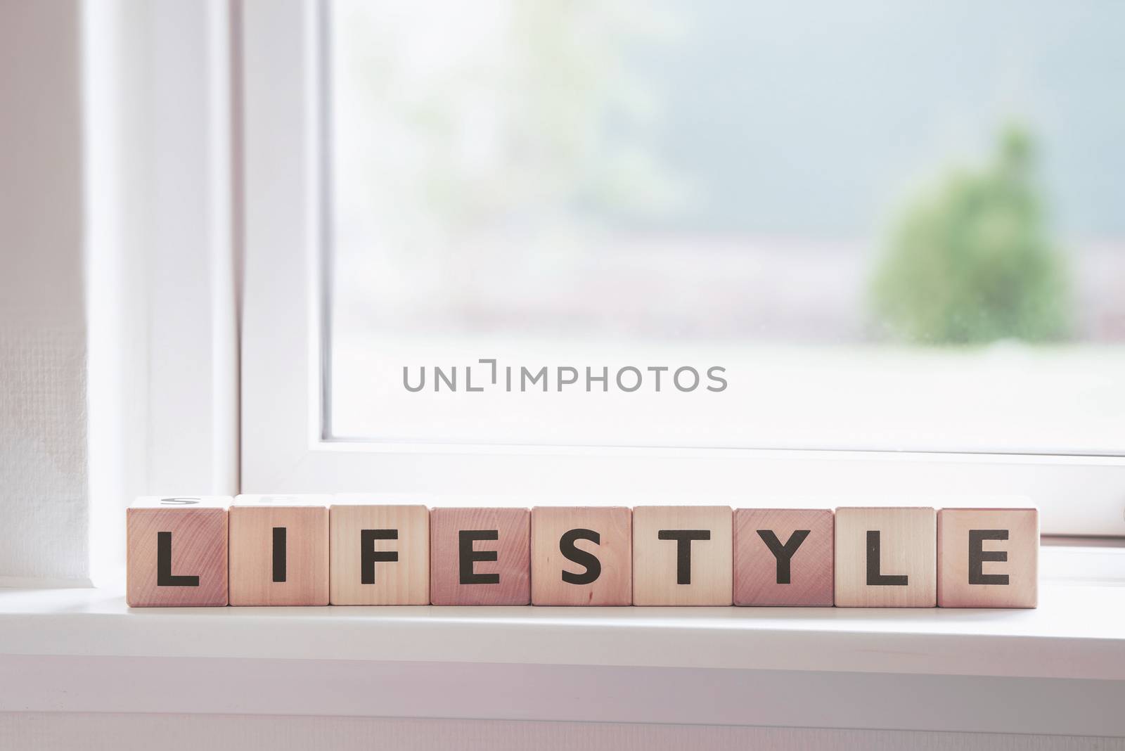 Lifestyle sign in a window in a bright room