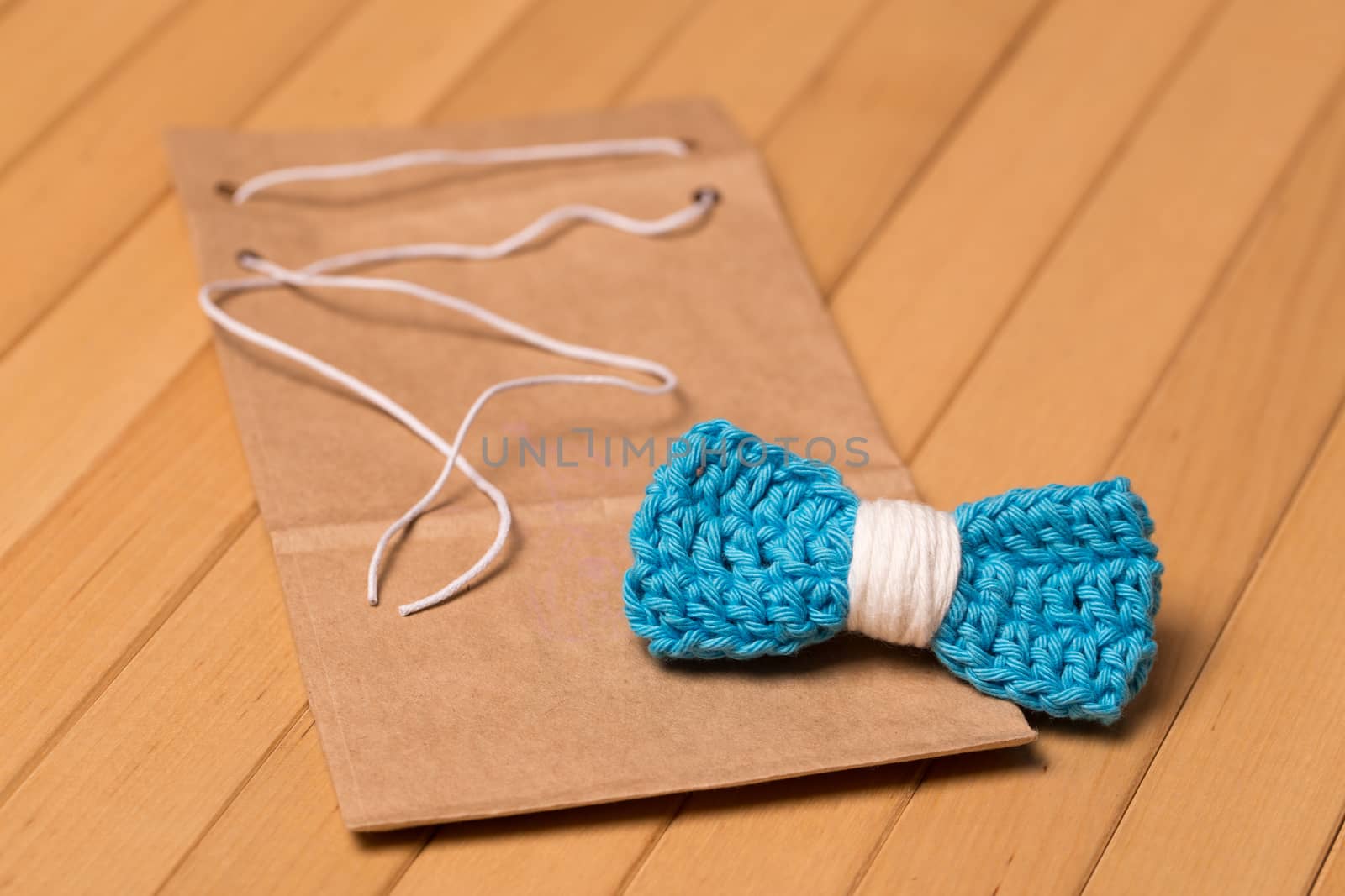 Beautiful, knitted bow tie made by crochet.