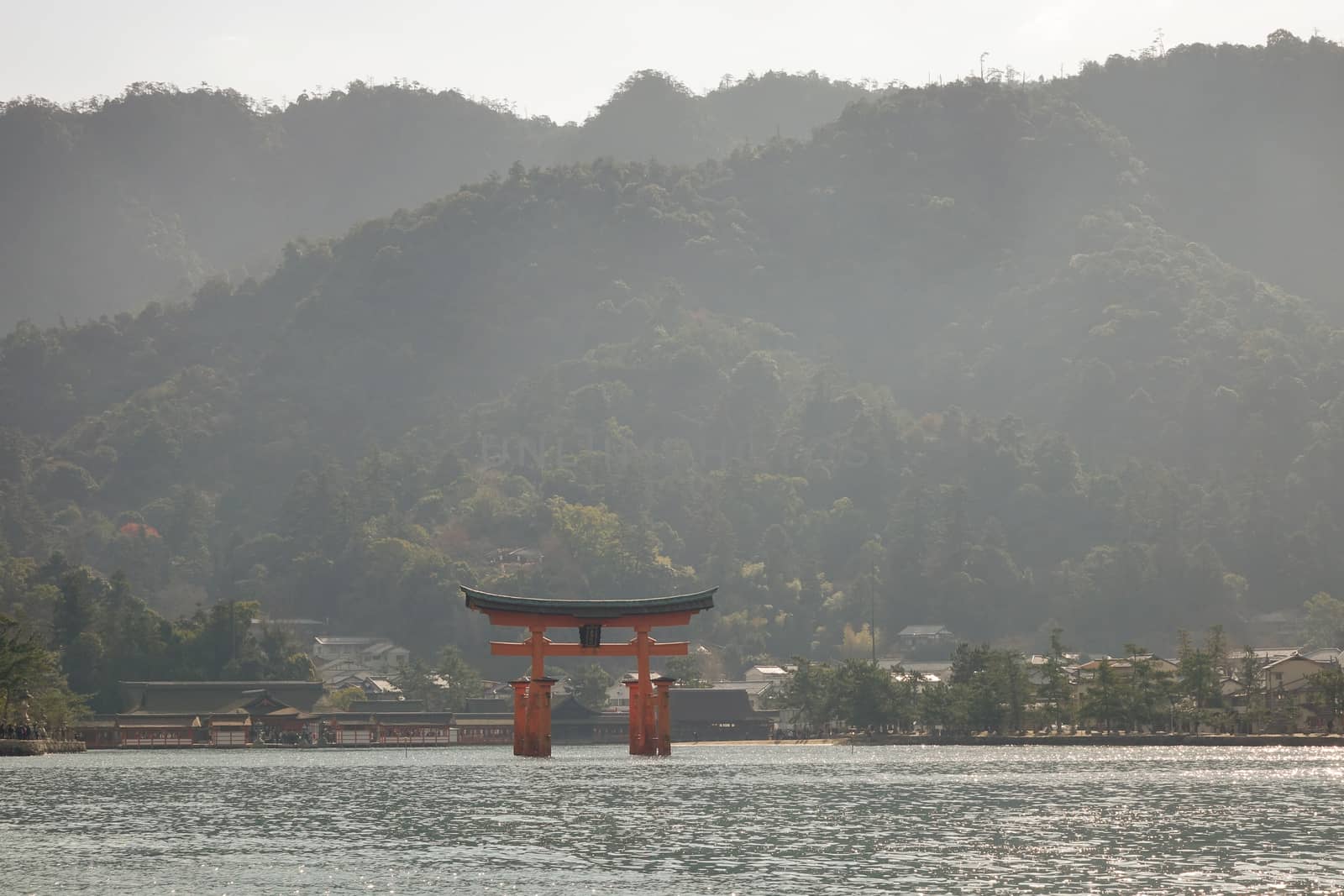 Floating gate of Itsukushima Shrine in Japan by travellens