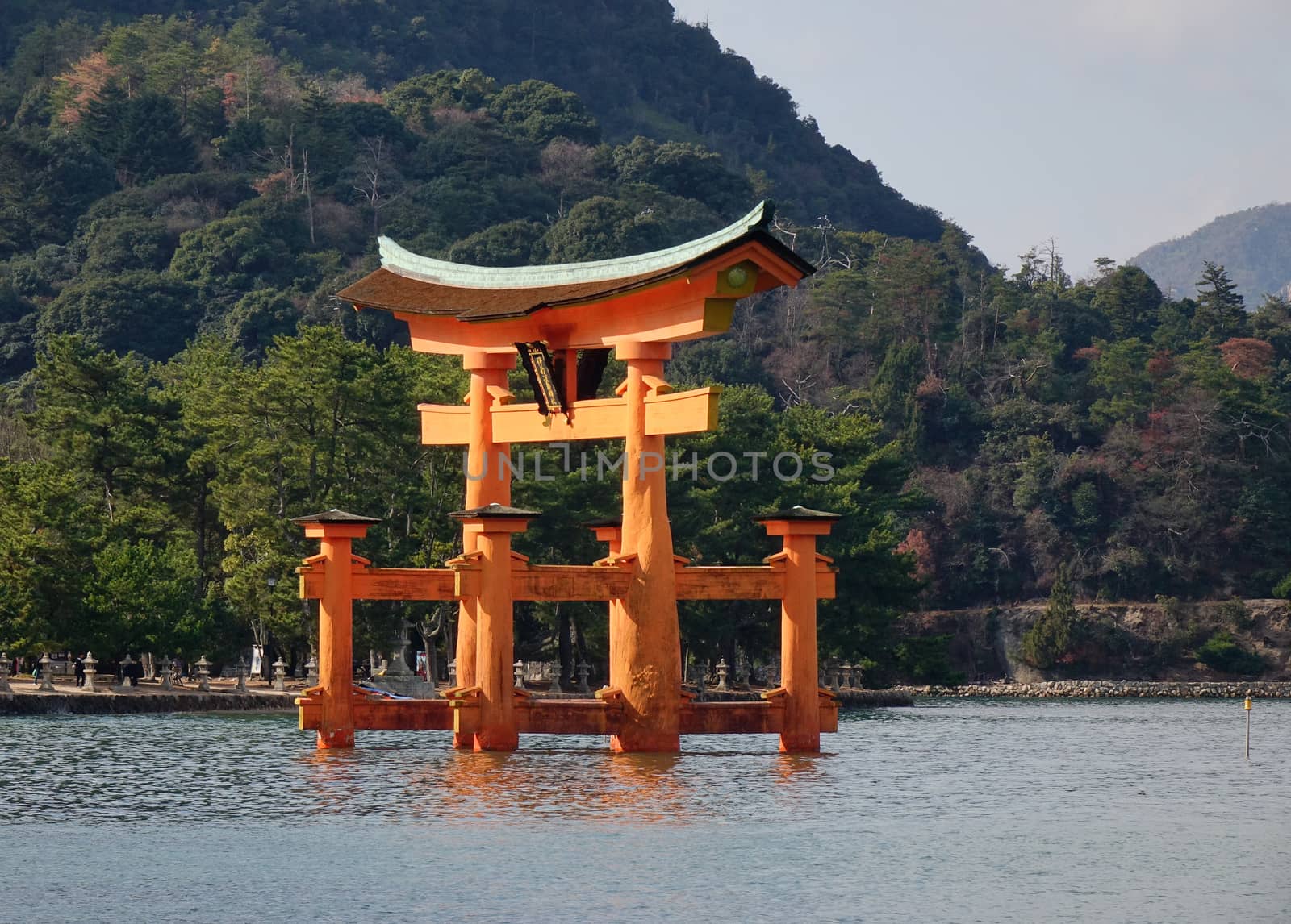 Floating gate of Itsukushima Shrine in Japan by travellens