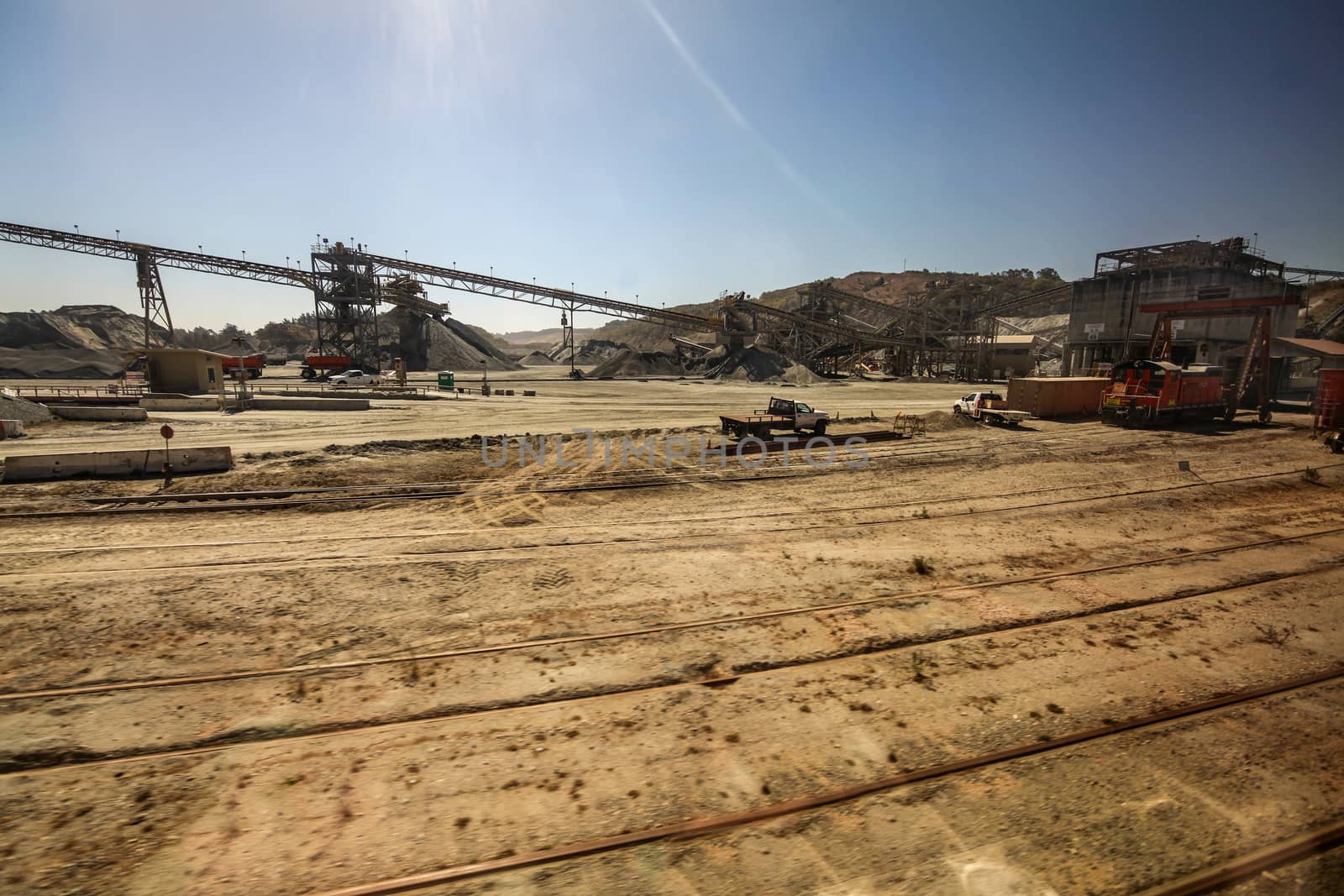 A construction site with a lot of dirt and travelators