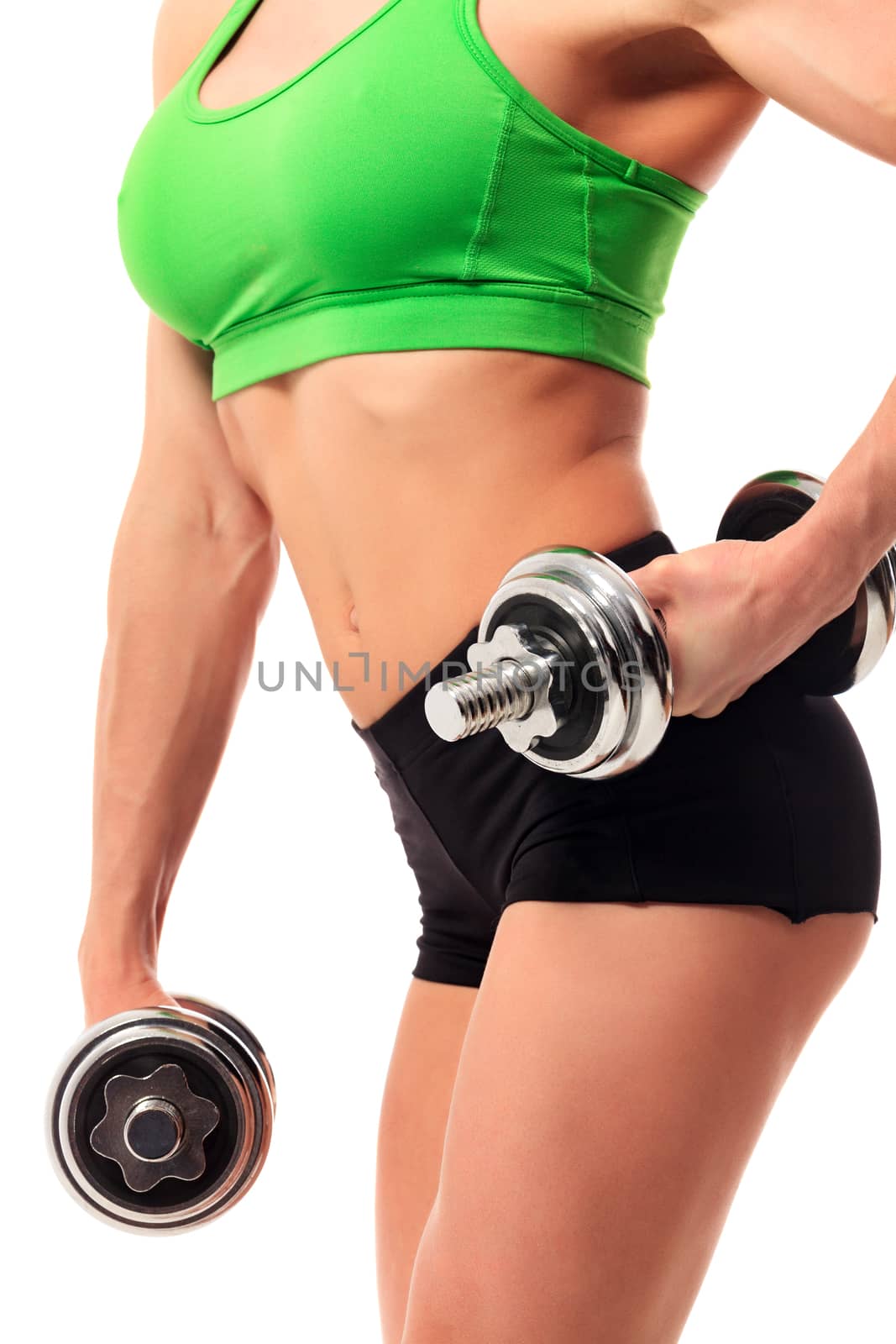 Sexy young fitness woman doing workout with dumbbells, isolated on white background