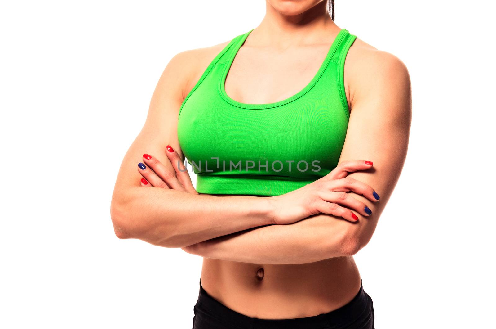 Close up shot of young sportswoman body. Fitness and healthy lady on white background, isolated